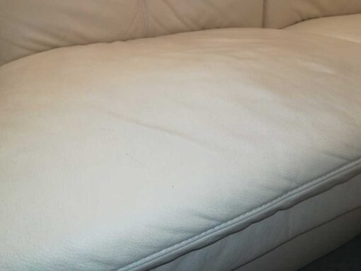 Beige Leather Couch With Adjustable Headrests